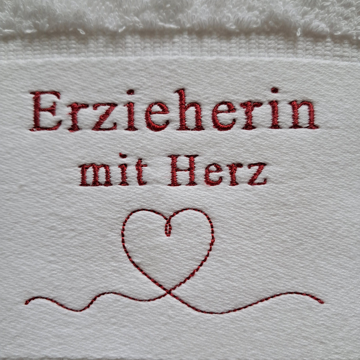 Personalisiertes Handtuch „mit Herz“ mit Wunschbezeichnung und Wunschname